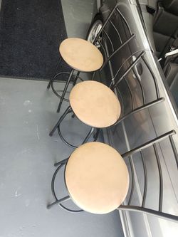 Three bar stools