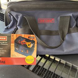 This item is a Craftsman wide-mouth tool bag, typically featuring a durable polyester construction, zippered opening for easy access, and multiple poc