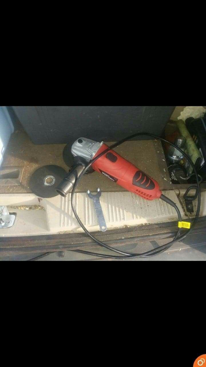 Grinder, drills, jack stands, drill bit set