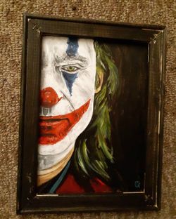 Joker ( Joaquin Phoenix)