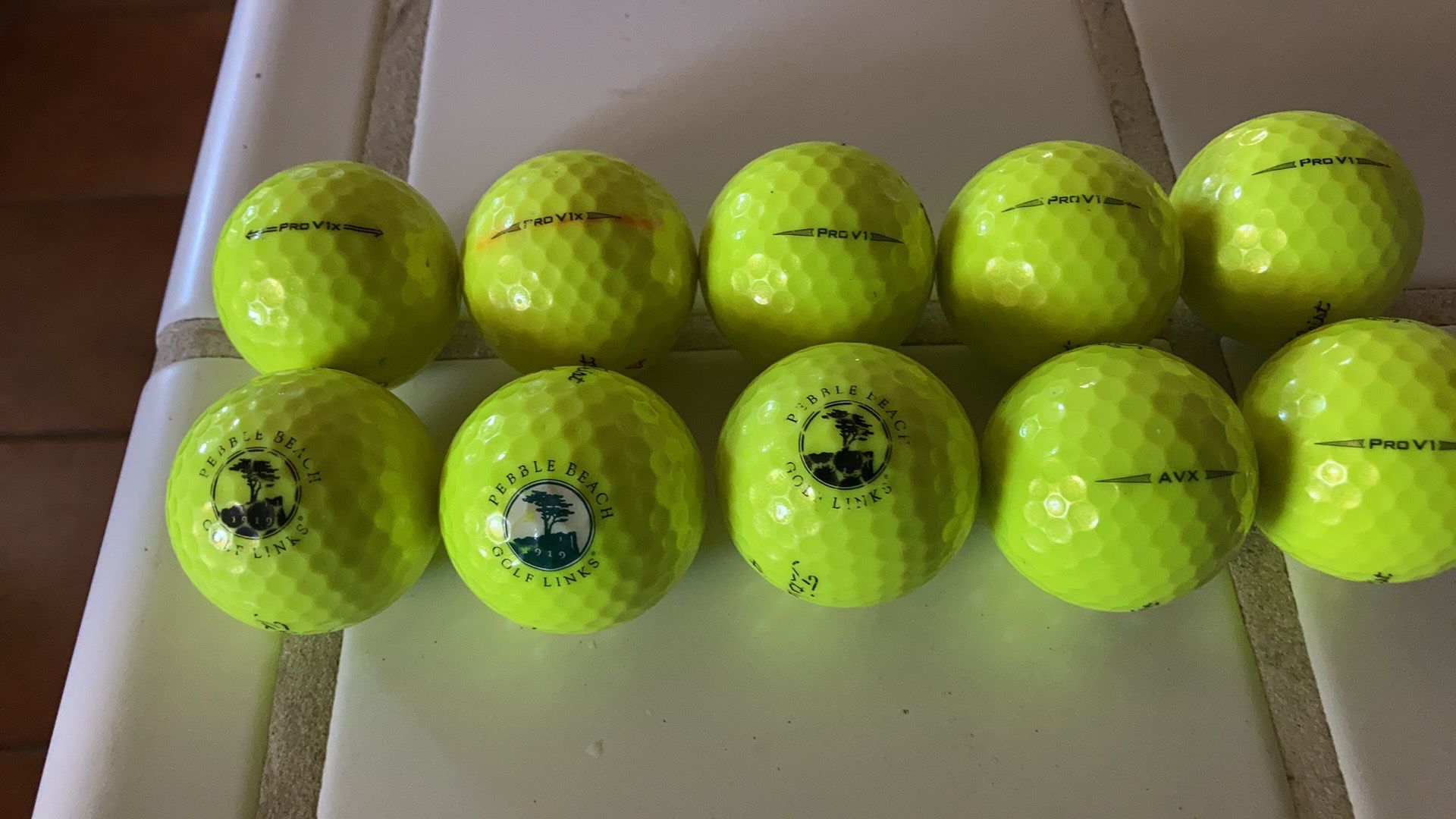 Colored Pebble Beach Titleist Pro V1X, V1, & AVX Golf Balls (10)