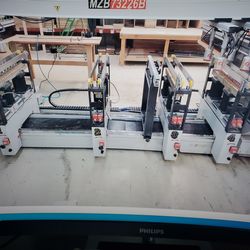 Multi spindle drill press. Six-raw woodworking drill. Boring machine