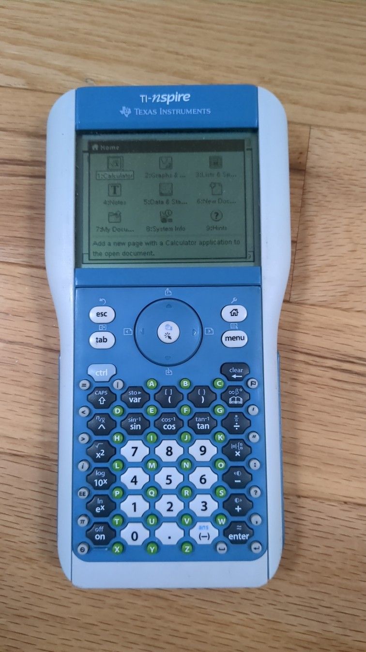 Texas Instruments TI-nspire Graphing Calculator + Extra TI-84 Plus Keypad