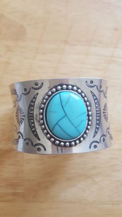 Silver Tone cuff with turquoise stone