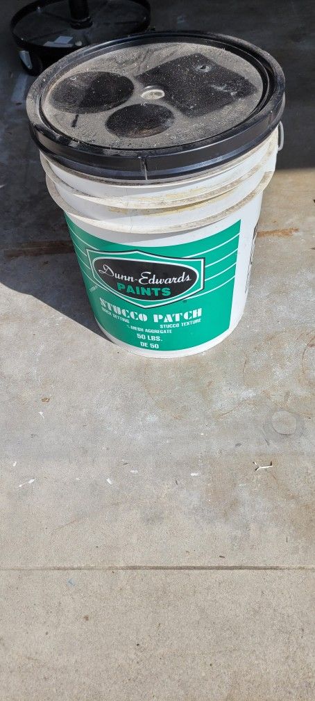 50 Gallon Bucket Of Stucco Half Full