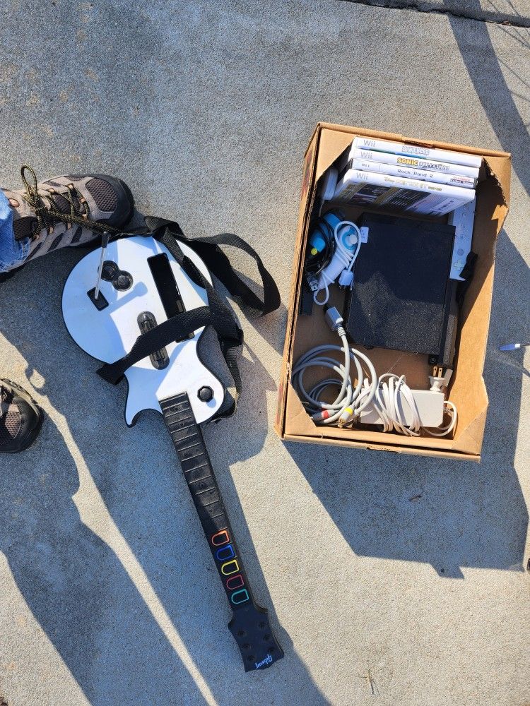 Wii And Games With Gaming Guitar