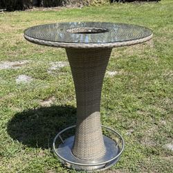 Solid Stainless And Rattan HighTop Table