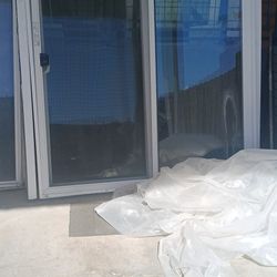 Sliding Patio Door With Screen  Horizontal Window.its Fixed It Does Not Open