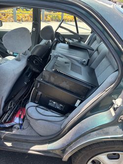 Car Full of Computers, Monitors, Keyboatds, and mice