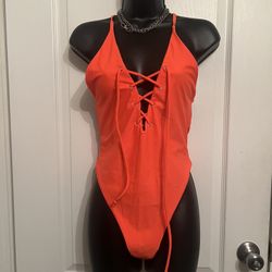 NWOT- Versatile Sexy Orange Lace up Bodysuit Bathing Suit/1 Piece 🧡🍑 ( Bathing suit / Orange Bodysuit / Rave Wear /rave Outfit) 