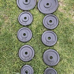 55 lbs of clean weight plates 1” hole