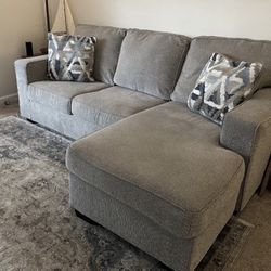 Light Gray Modern Greaves 85” Sectional Sofa with Reversible Chaise by Ashley HomeStores