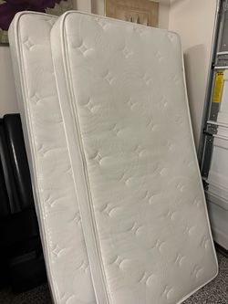 Two twin size mattresses
