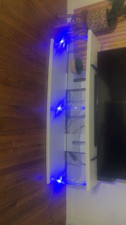 white TV stand with light