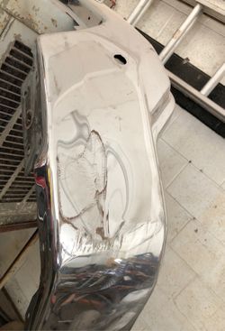 2020 GMC front chrome bumper with small damage make an offer cash or trade