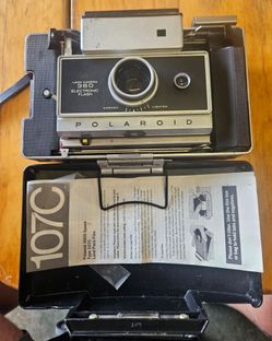 AI Overview    +7                    A vintage Polaroid 360 Land Camera Electronic Flash