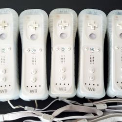 Nintendo wii Wiimotes controllers and rubber protector. Tested and working condition. All remotes are tested on wii sports and Mariokart.
 