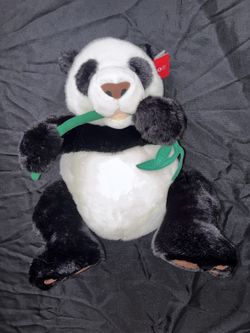 Vintage fao Schwarz panda bear with bamboo with tags