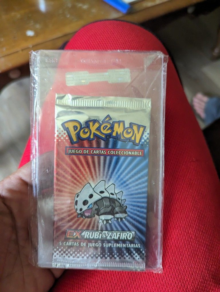 Graded Pokemon Slabs & Unopened Pack Of Rubi And Zafieo