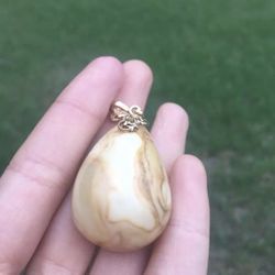 Antique amber pendent