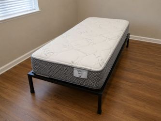 Twin Mattress (wrapped in plastic)
