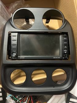 Jeep Compass Patriot radio instrument panel bezel