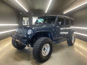 2016 Jeep Wrangler Sahara lifted on 37’s clean 58,000 miles