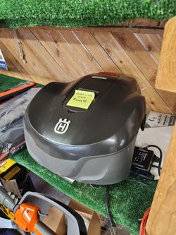 Husqvarna robotic automower  cuts your lawn on a schedule