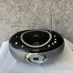 Coby CX-CD230 Portable CD Player with AM/FM Radio ~ Portable ~ Battery Operated