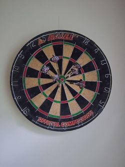 Dartboard and six darts