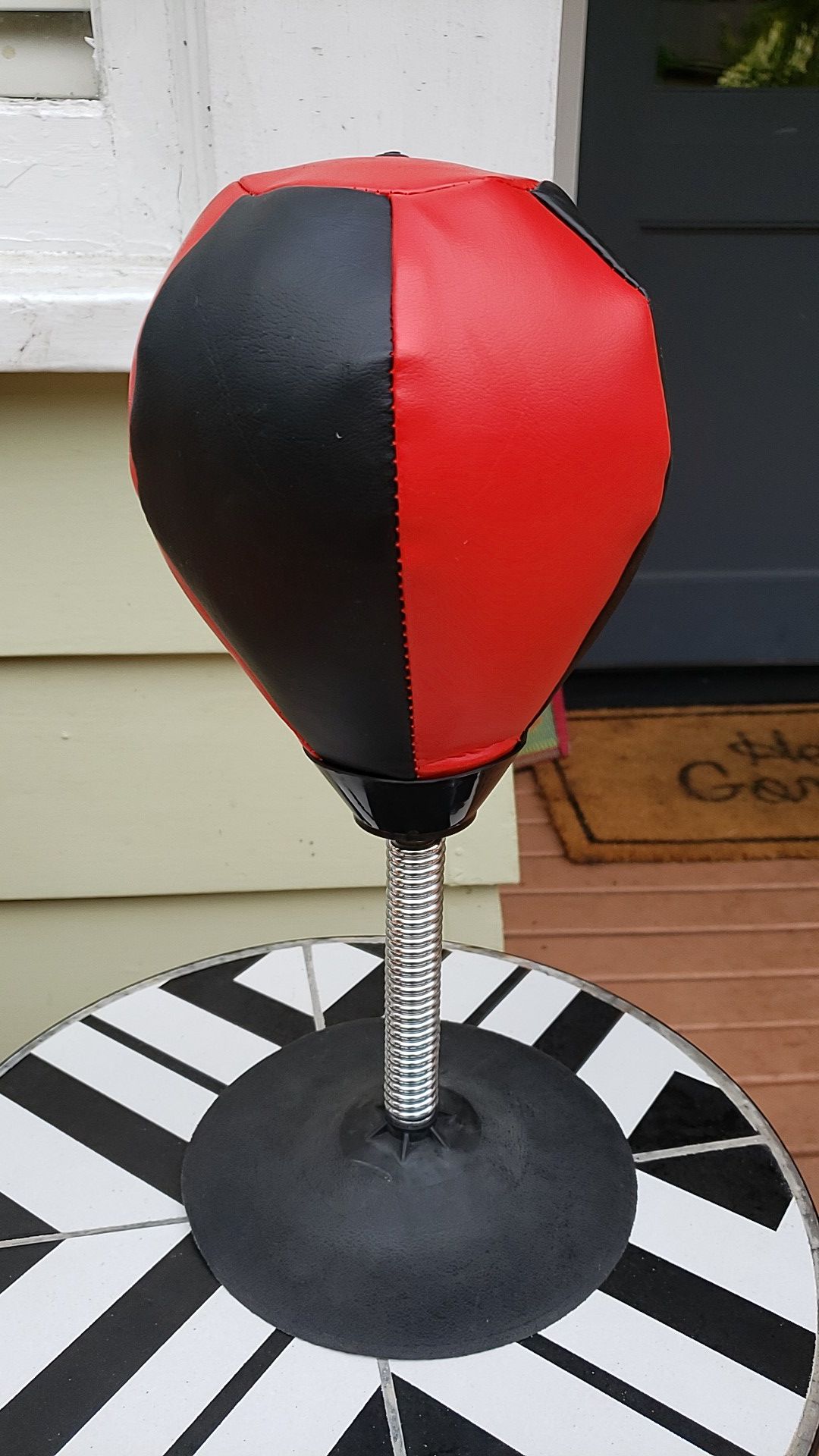 Table top punching speed bag