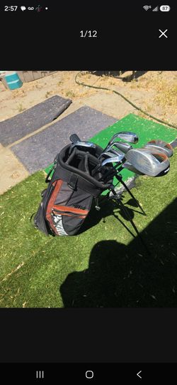 Wilson golf club set. Three drivers. Five irons. Putter and pitching wedge