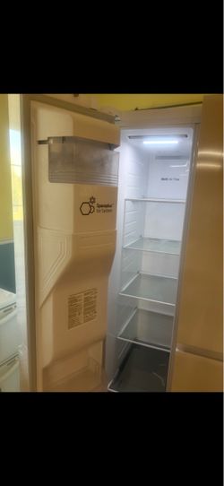 LG Side-by-Side Refrigerator with Ice System