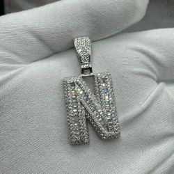 A Moissanite Initial in Sterling Silver with a CTW of 2.42 in Bugget Style