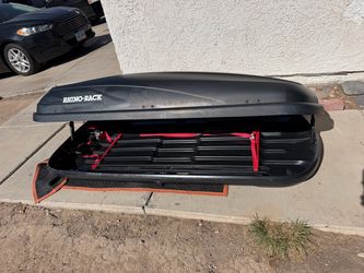 RHINO RACK ROOF USED. Small damage on the bottom