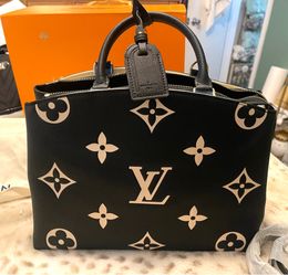 Louis Vuitton Monogram Empreinte Giant Bicolor Vavin PM