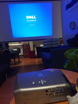 PORTABLE DELL HOME THEATER PROJECTOR w/ HDMI adapter