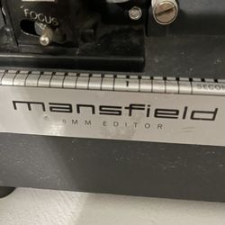 Mansfield Reporter Editor 8mm