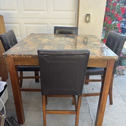 Strong Table and 4  Leather / wood chairs
