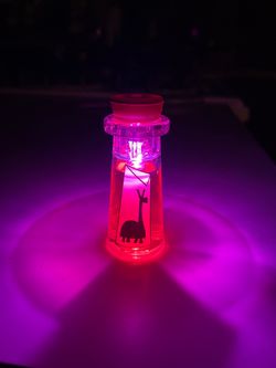 Disney Disneyland Kuzco’s Poison Bottle Glow Cube