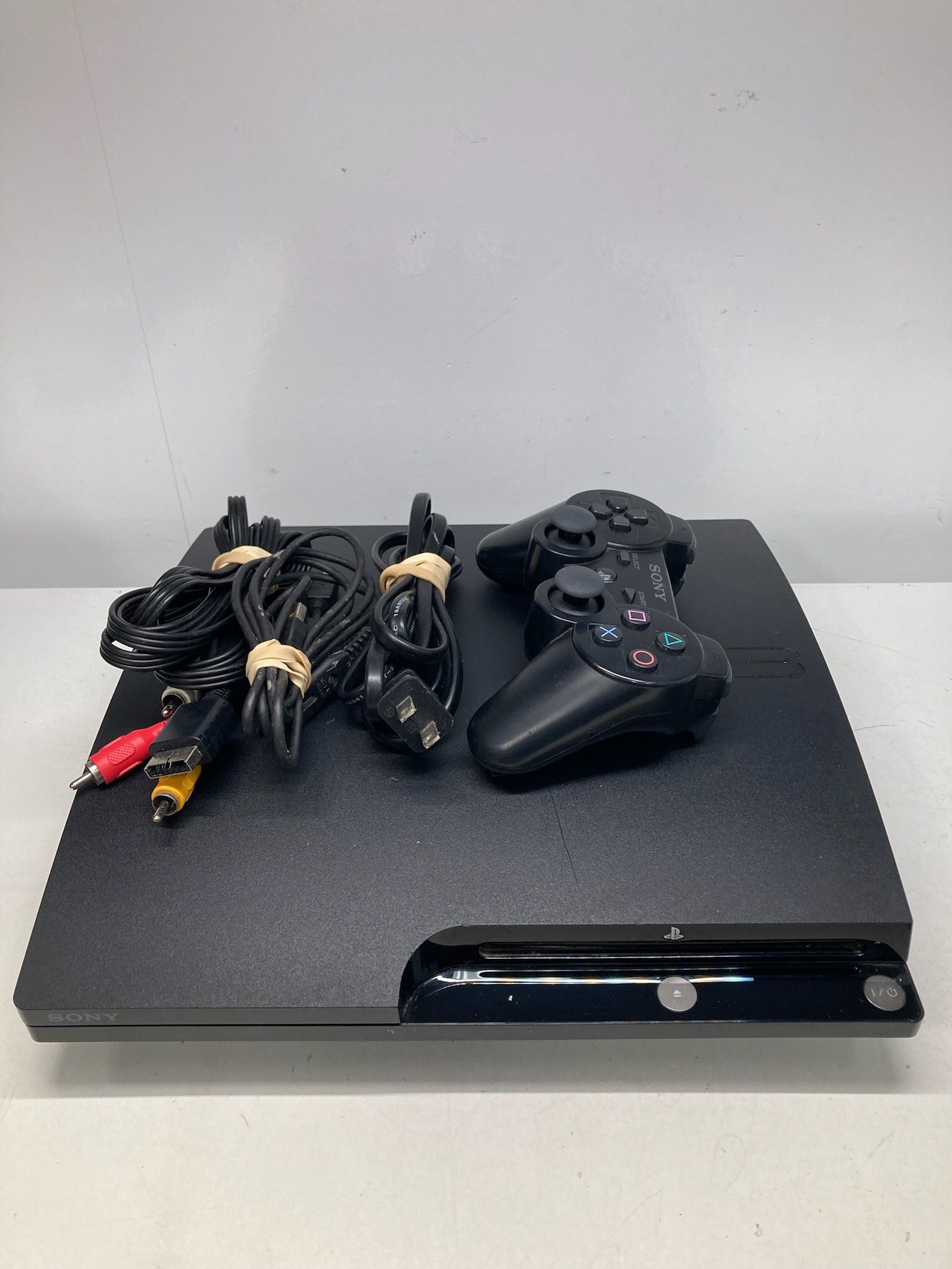 Sony PlayStation 3 PS3 Slim Console With Controller and Cords 
