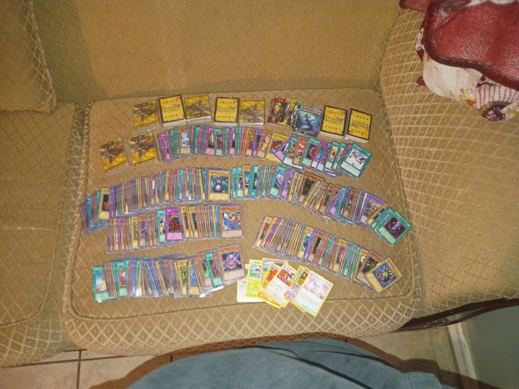 Yu-Gi-Oh cards from 1996 English cards and japanese /forien cards also a couple of Pokemon cards and dragon borne race supremacy