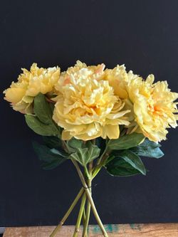 Faux yellow peonies flower