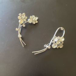 A Couple Of Silver Diamond Broaches