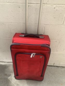 Carry-on Suitcase On Rollers. Carry On Plane . Reduced