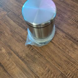 Unused Sleek Stainless Steel Step Trash Can