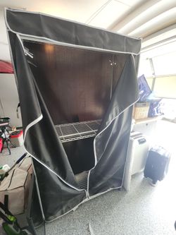 Clothing rack with cover