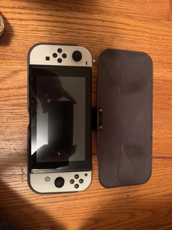 Nintendo Switch V2 with white joy cons, Hoki Ergo grip Joy Cons and dock,