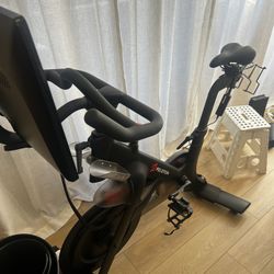 Peloton Bike With Weights And Sweat Mat