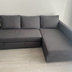 Sofá cama esquinero+almacenamiento, Skiftebo gris oscuro
